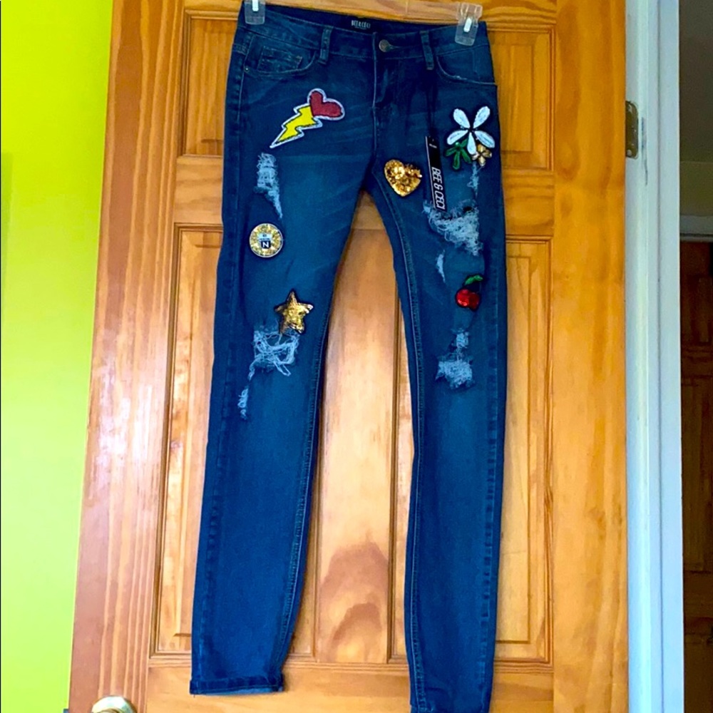 Sequin patch ripped skinny jeans